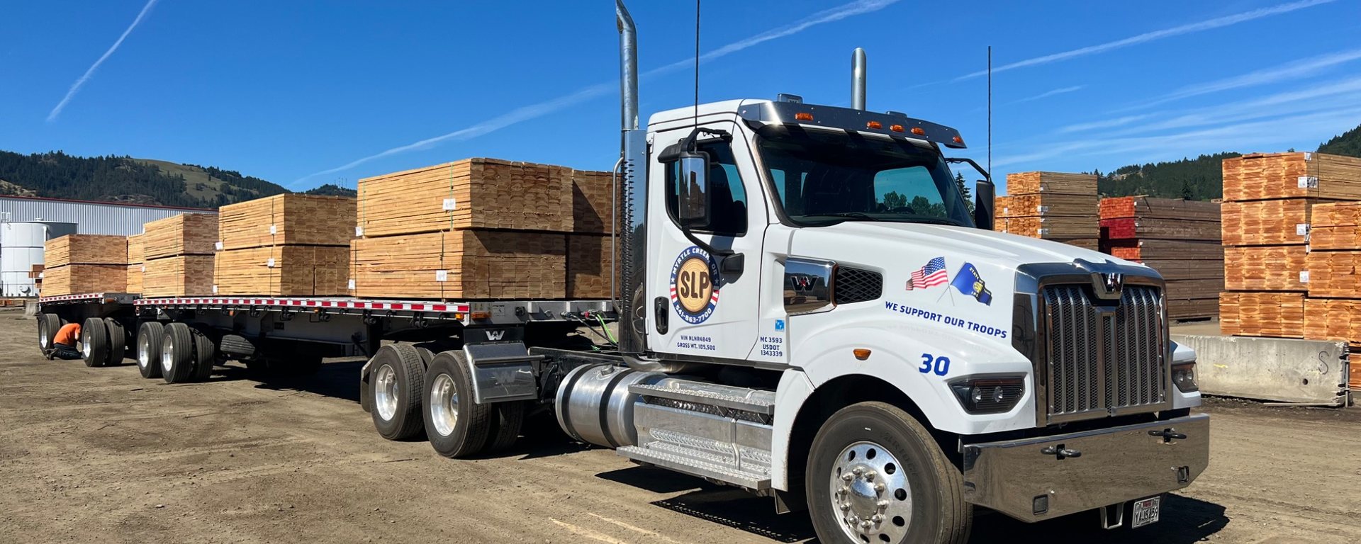 SLP truck loaded with Douglas fir lumber at the yard